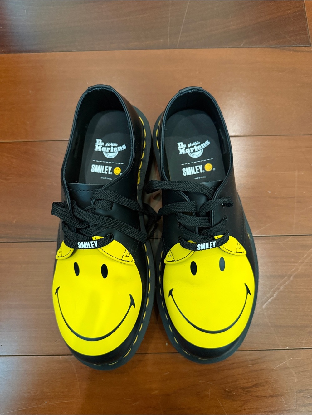 Dr. Martens Black and Yellow Smiley Face Lace-Up Sneakers
